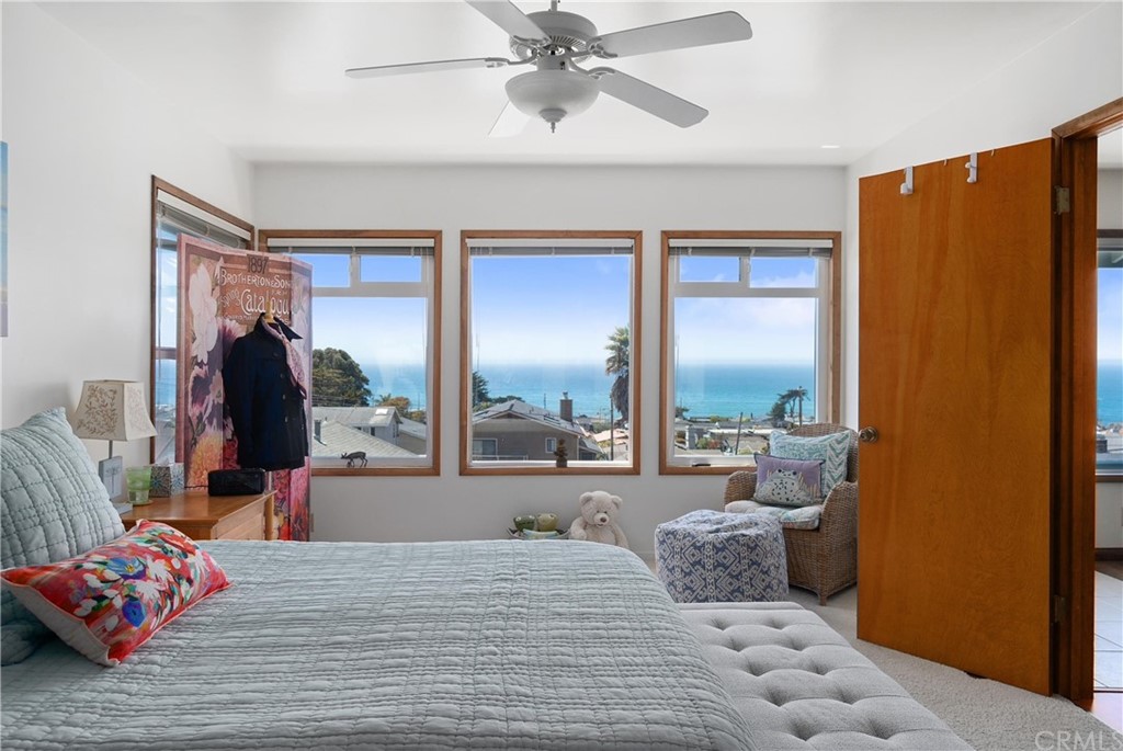 188 8th Street Cayucos, CA 93430 - Photo 17 of 33 a bedroom with a bed and a window