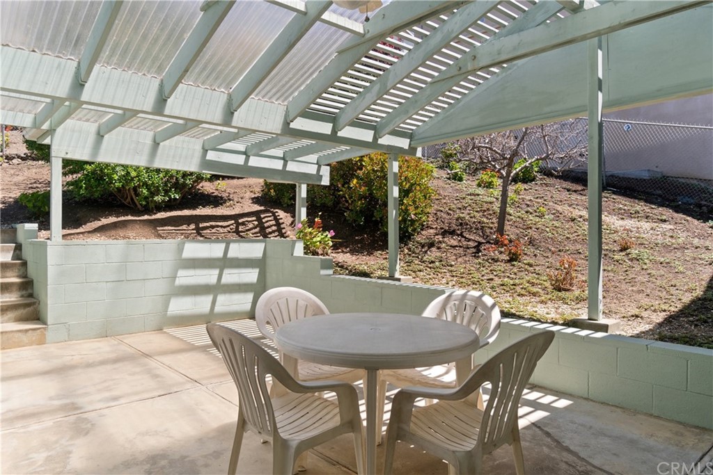 188 8th Street Cayucos, CA 93430 - Photo 27 of 33 a patio with a table and chairs