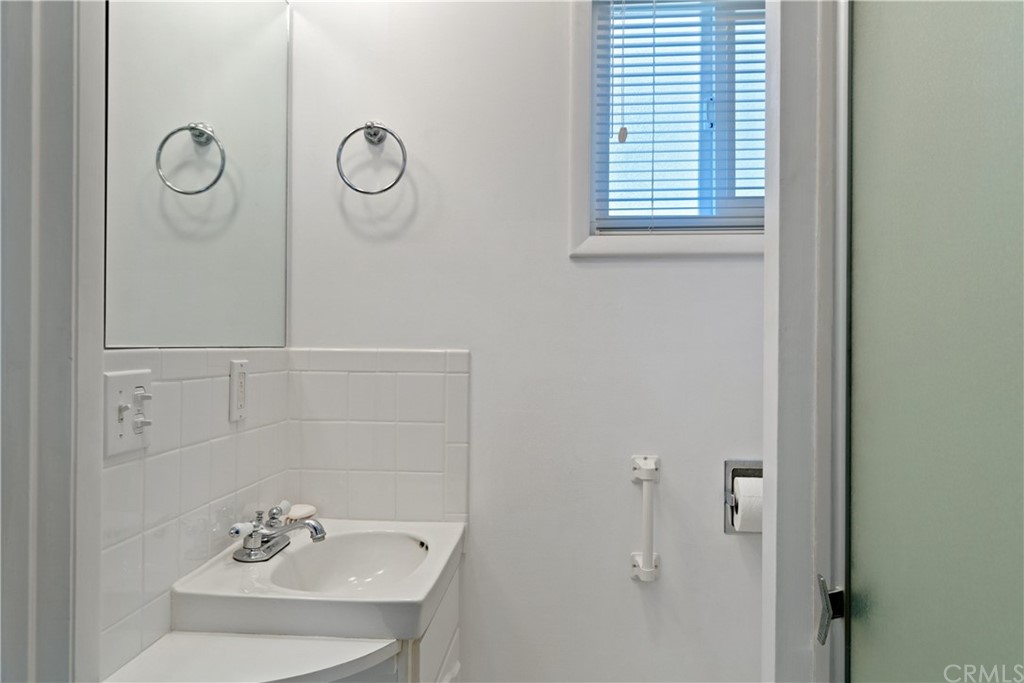 188 8th Street Cayucos, CA 93430 - Photo 30 of 33 a bathroom with a shower and vanity