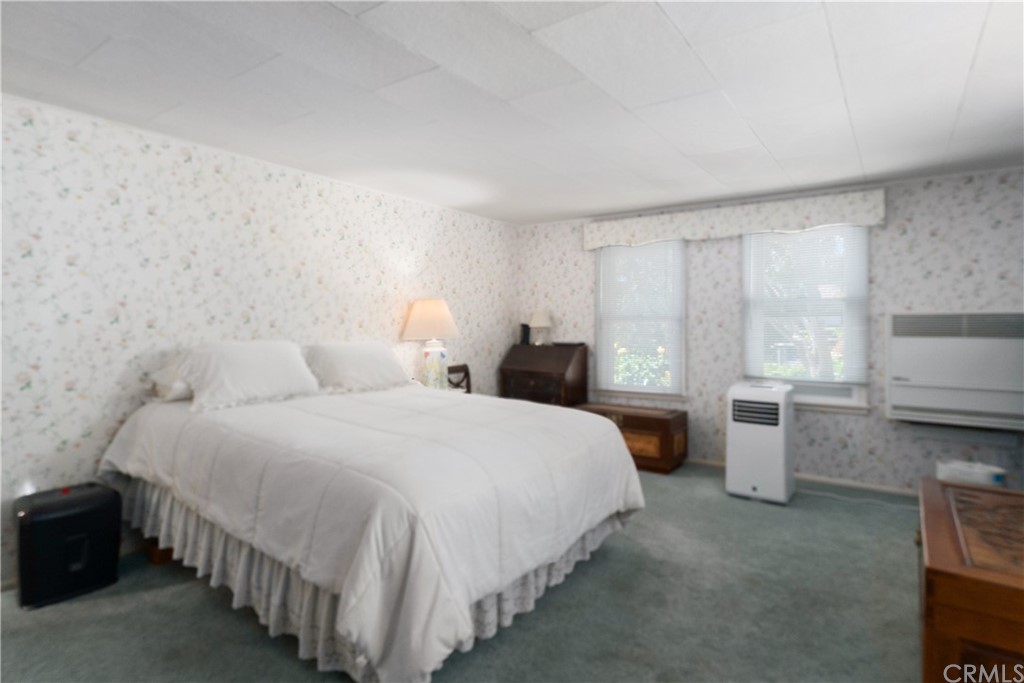 188 8th Street Cayucos, CA 93430 - Photo 6 of 33 a bedroom with bed and window