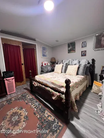 a white bath tub sitting next to a bathroom