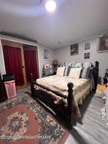 a white bath tub sitting next to a bathroom