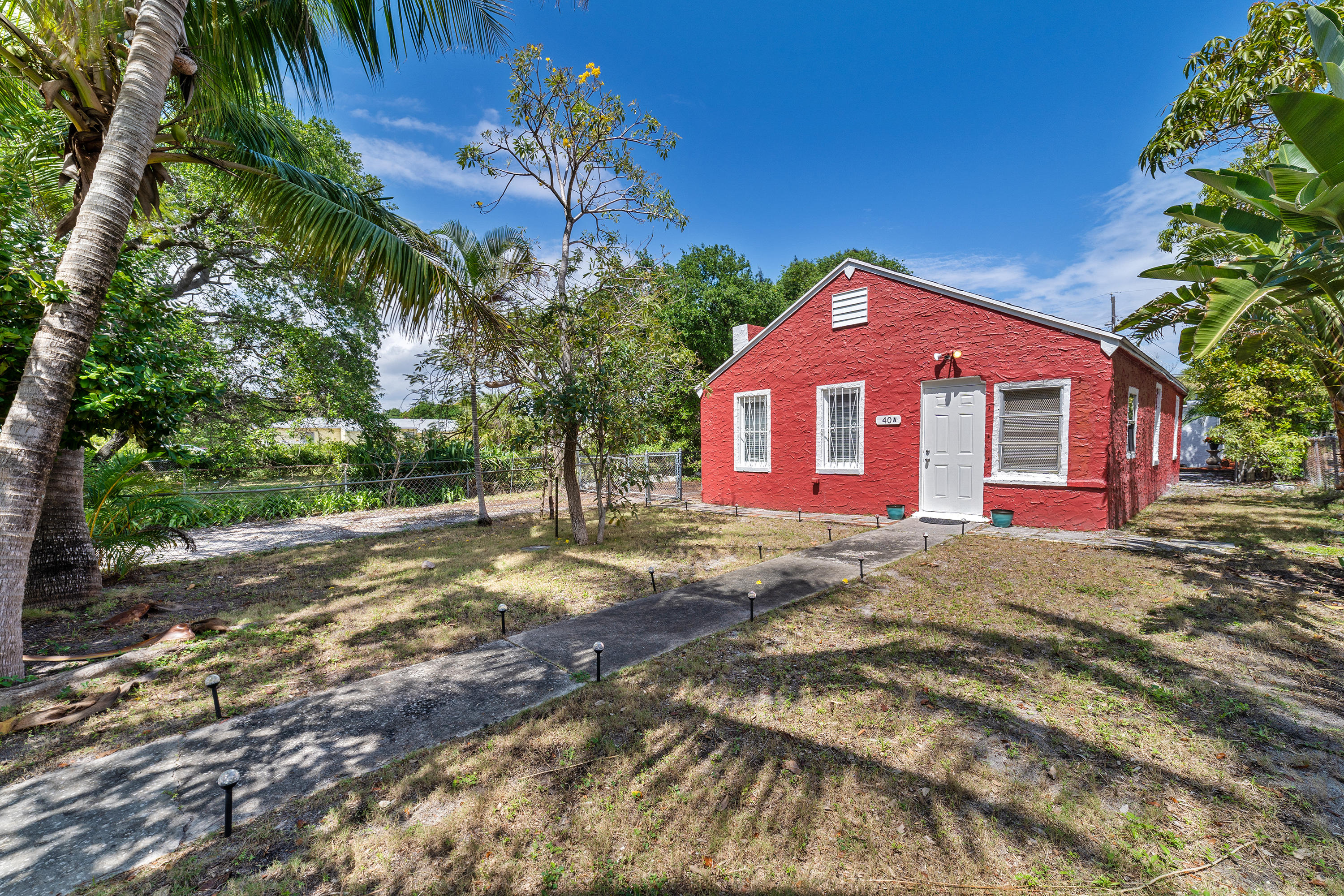 40 West 10th Street Riviera Beach, FL 33404 - Photo 1 of 37 Front 40 W 10th