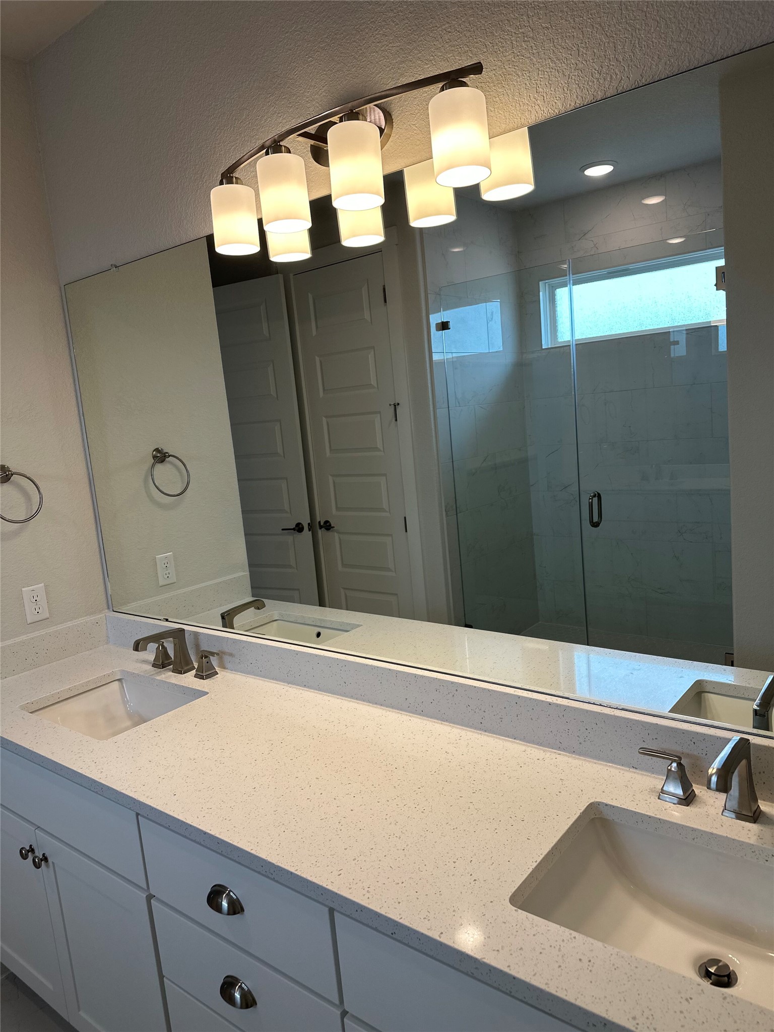412 Lariat Loop Liberty Hill, TX 78642 - Photo 21 of 38 a bathroom with a sink and a mirror