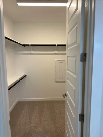 a bathroom with a toilet and a bathtub