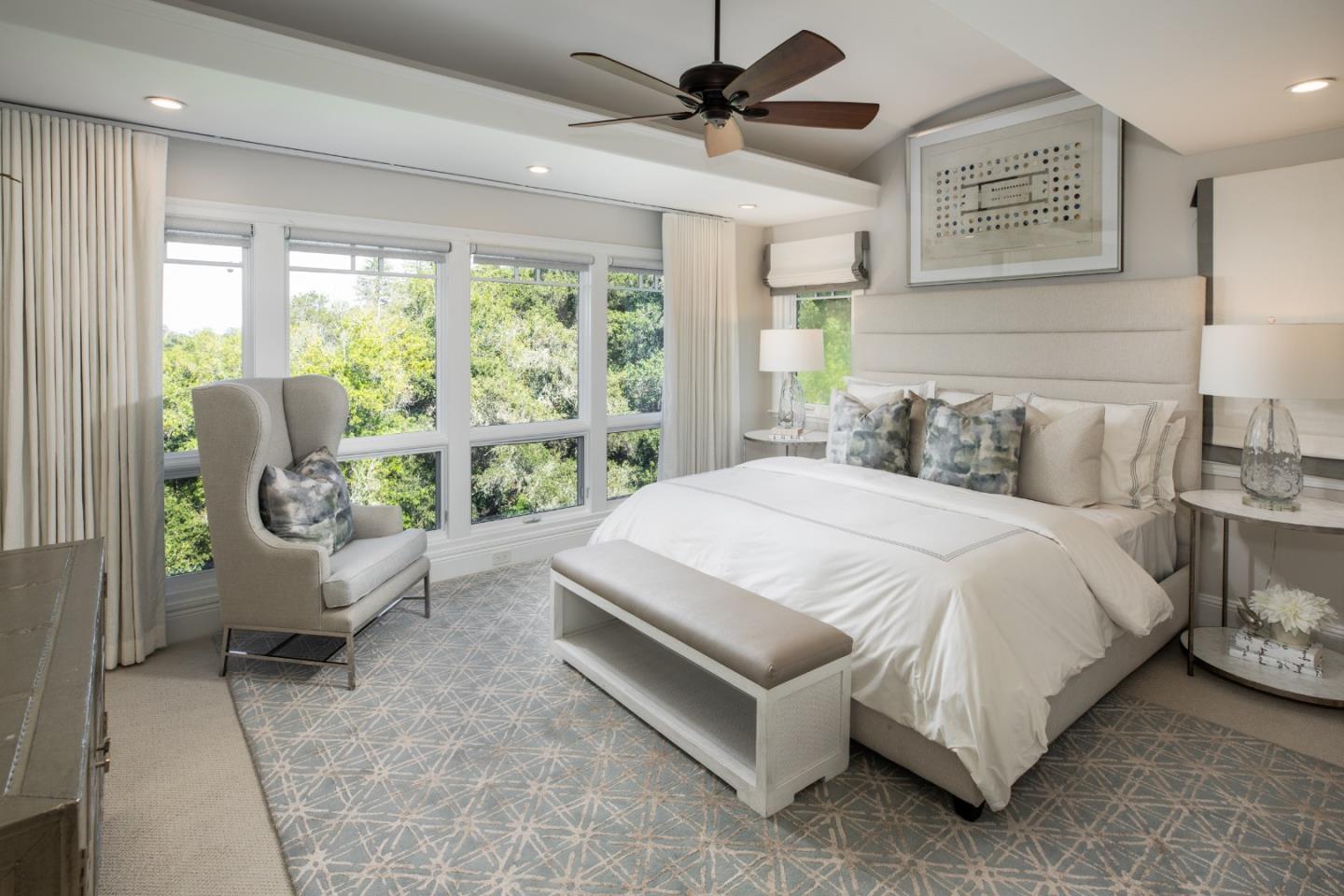 345 Harcross Road Woodside, CA 94062 - Photo 18 of 37 a bedroom with a bed a desk and chair