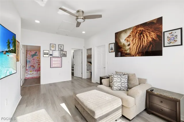 a view of a livingroom with furniture and window