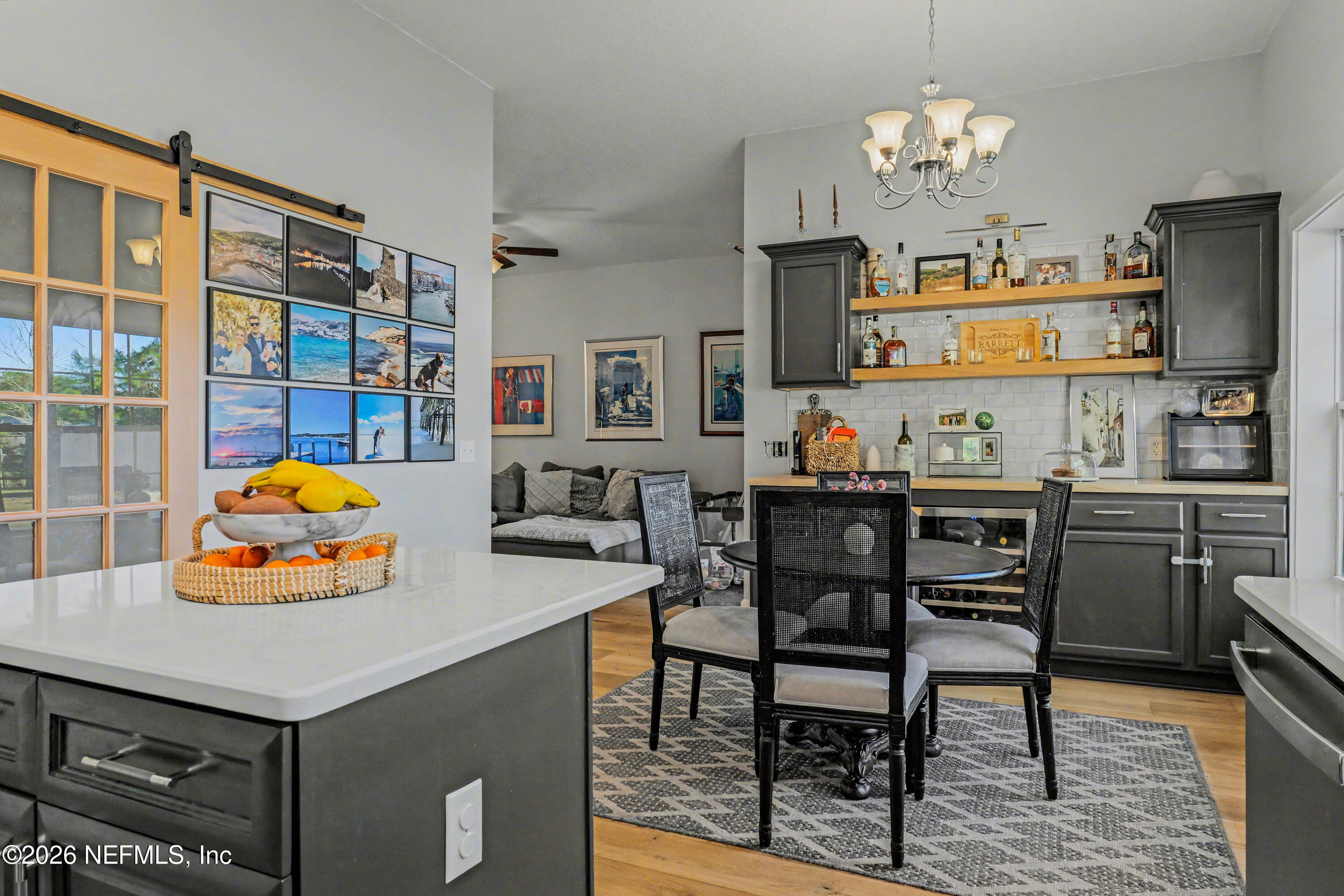 87159 Chesapeake Avenue Yulee, FL 32097 - Photo 11 of 46 a living room with dining table and chairs