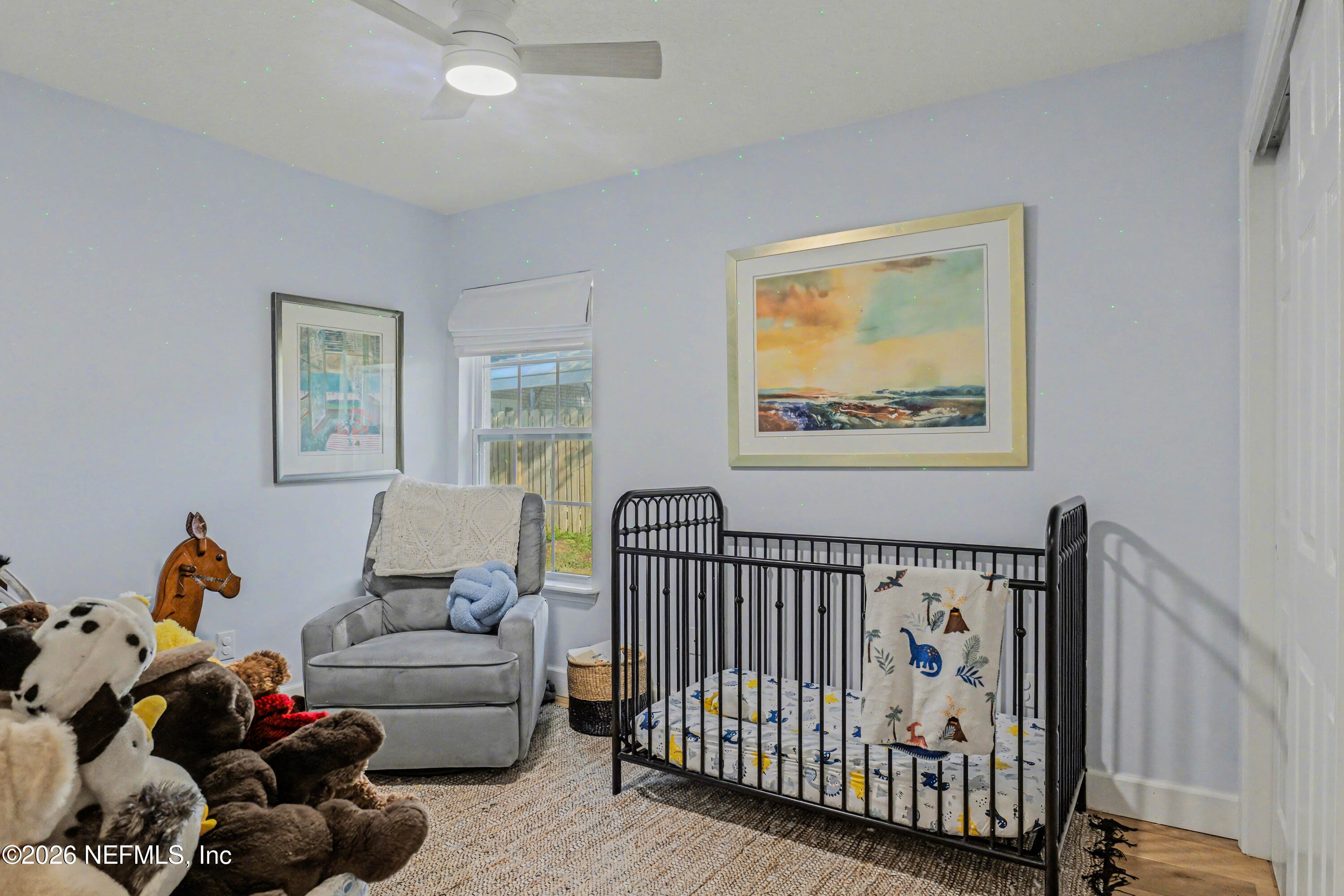 87159 Chesapeake Avenue Yulee, FL 32097 - Photo 26 of 46 a bedroom with furniture and a window