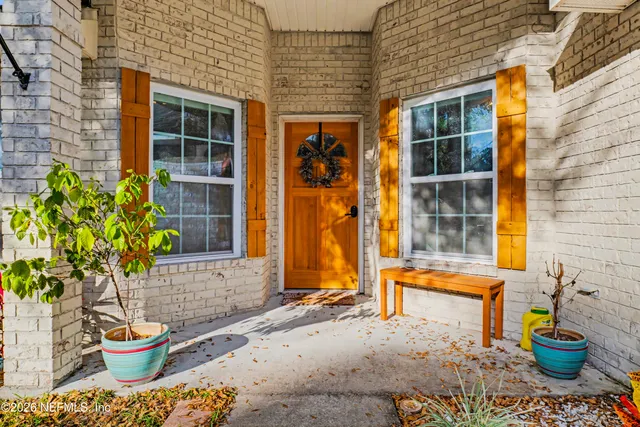 a house view with a potted plant