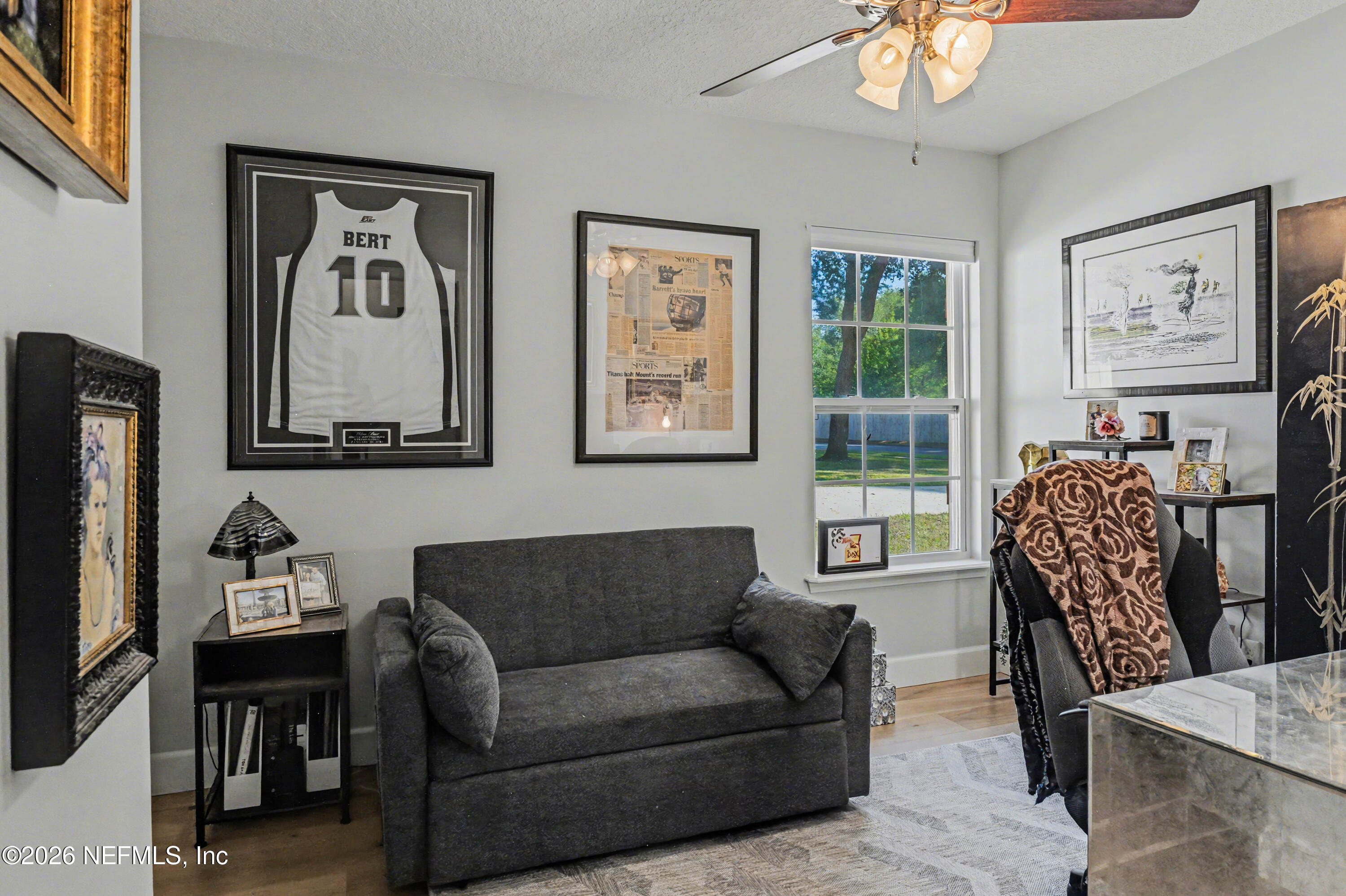 87159 Chesapeake Avenue Yulee, FL 32097 - Photo 35 of 46 a living room with furniture and a window