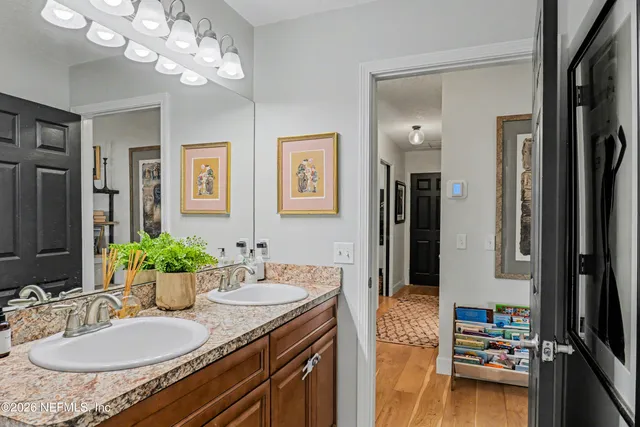 a outdoor living space with furniture and a flat screen tv