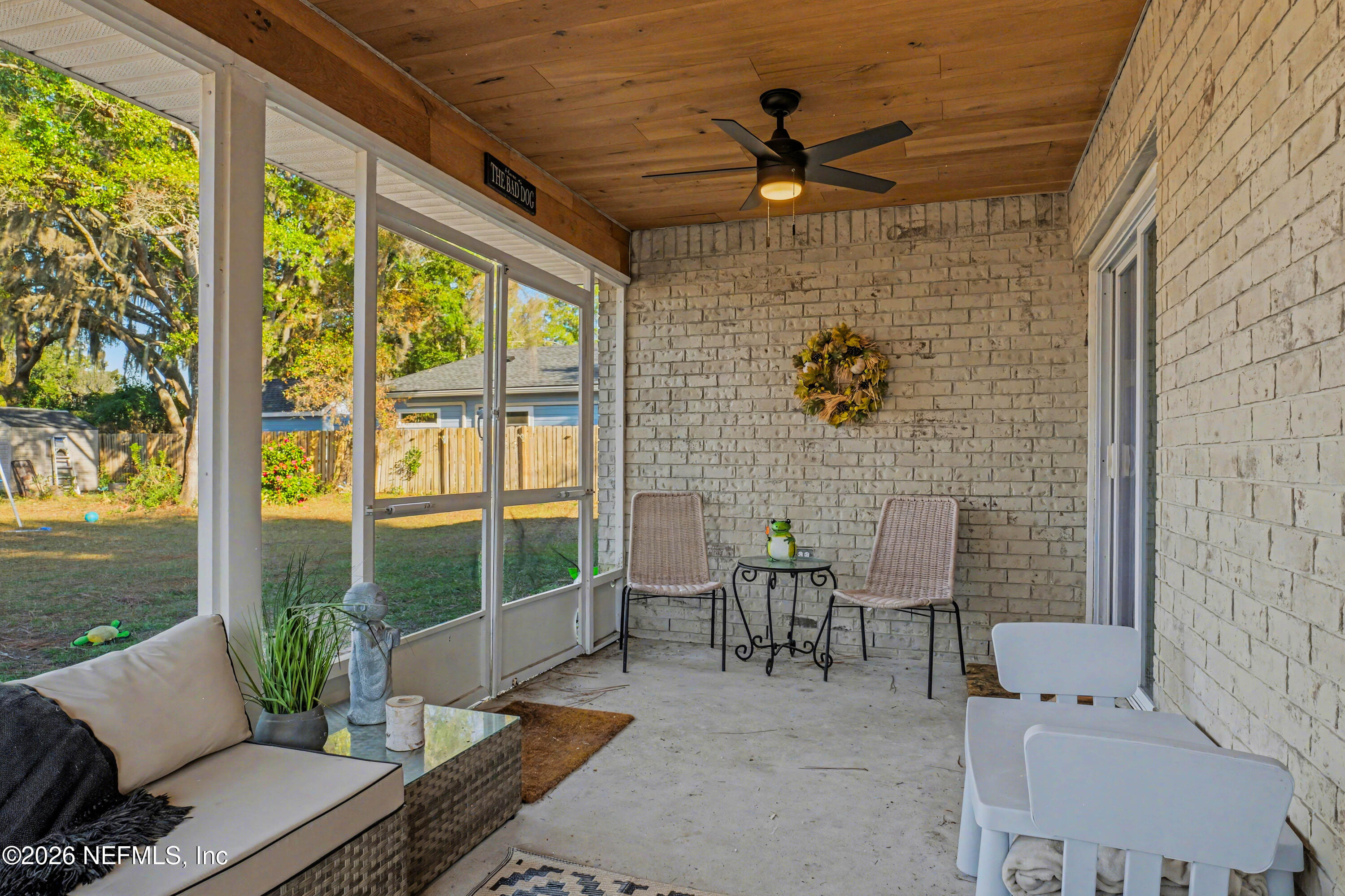 87159 Chesapeake Avenue Yulee, FL 32097 - Photo 40 of 46 a view of porch with furniture