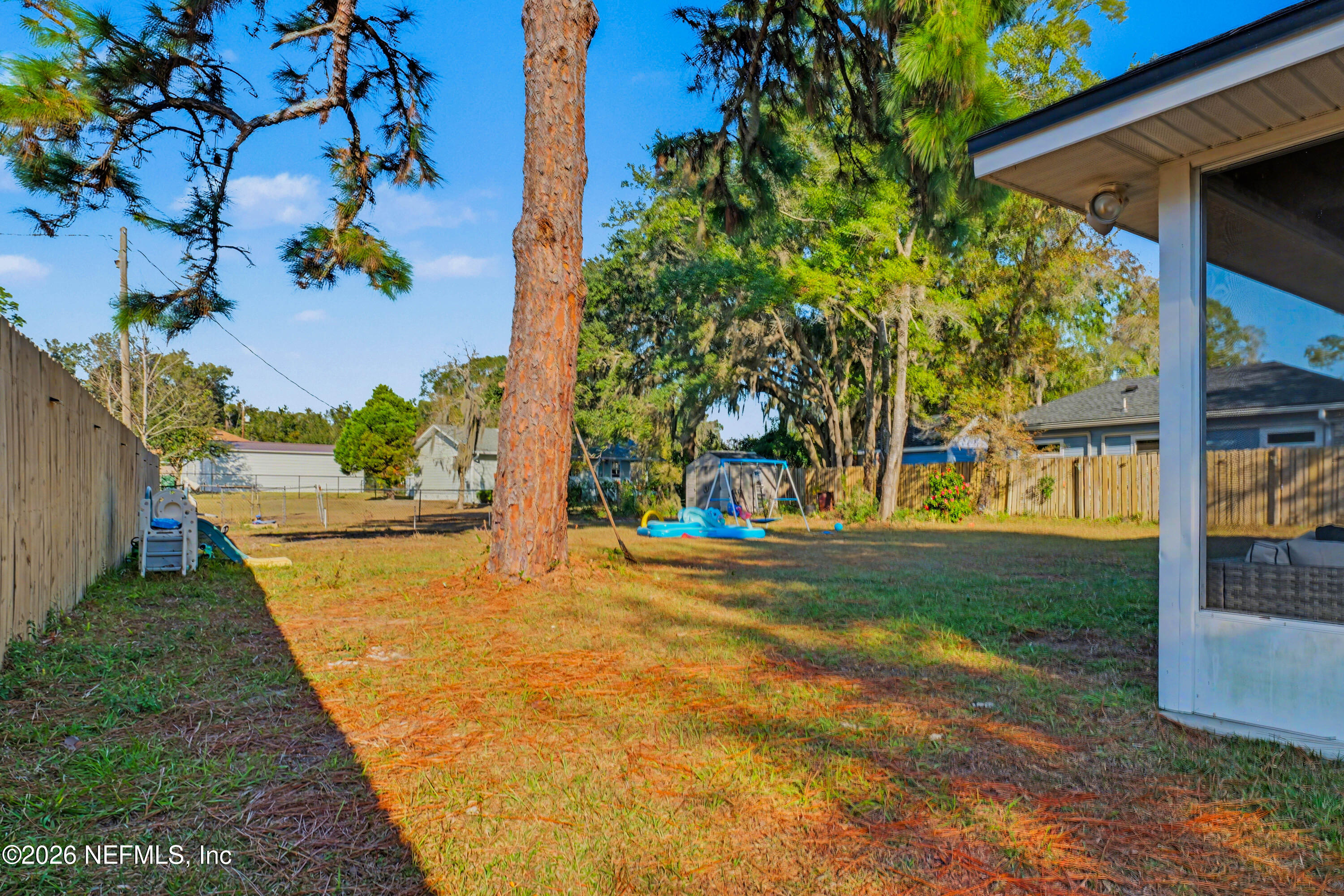 87159 Chesapeake Avenue Yulee, FL 32097 - Photo 44 of 46 a view of a yard with plants