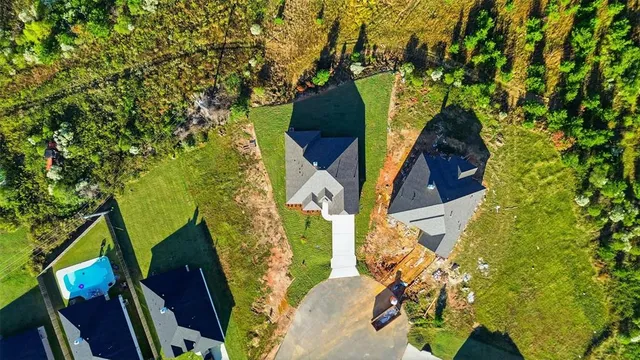 a view of a house with a tree