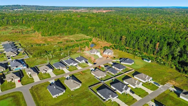 a view of swimming pool from a balcony