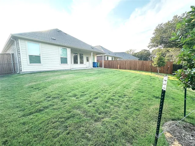a house view with a garden space