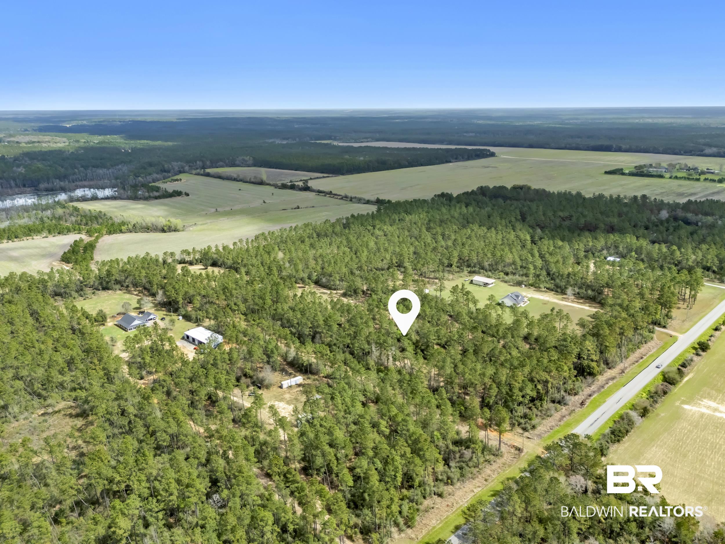 0 Gardner Road Elberta, AL 36530 - Photo 14 of 19 View of rural area with a forest and extensive farmland