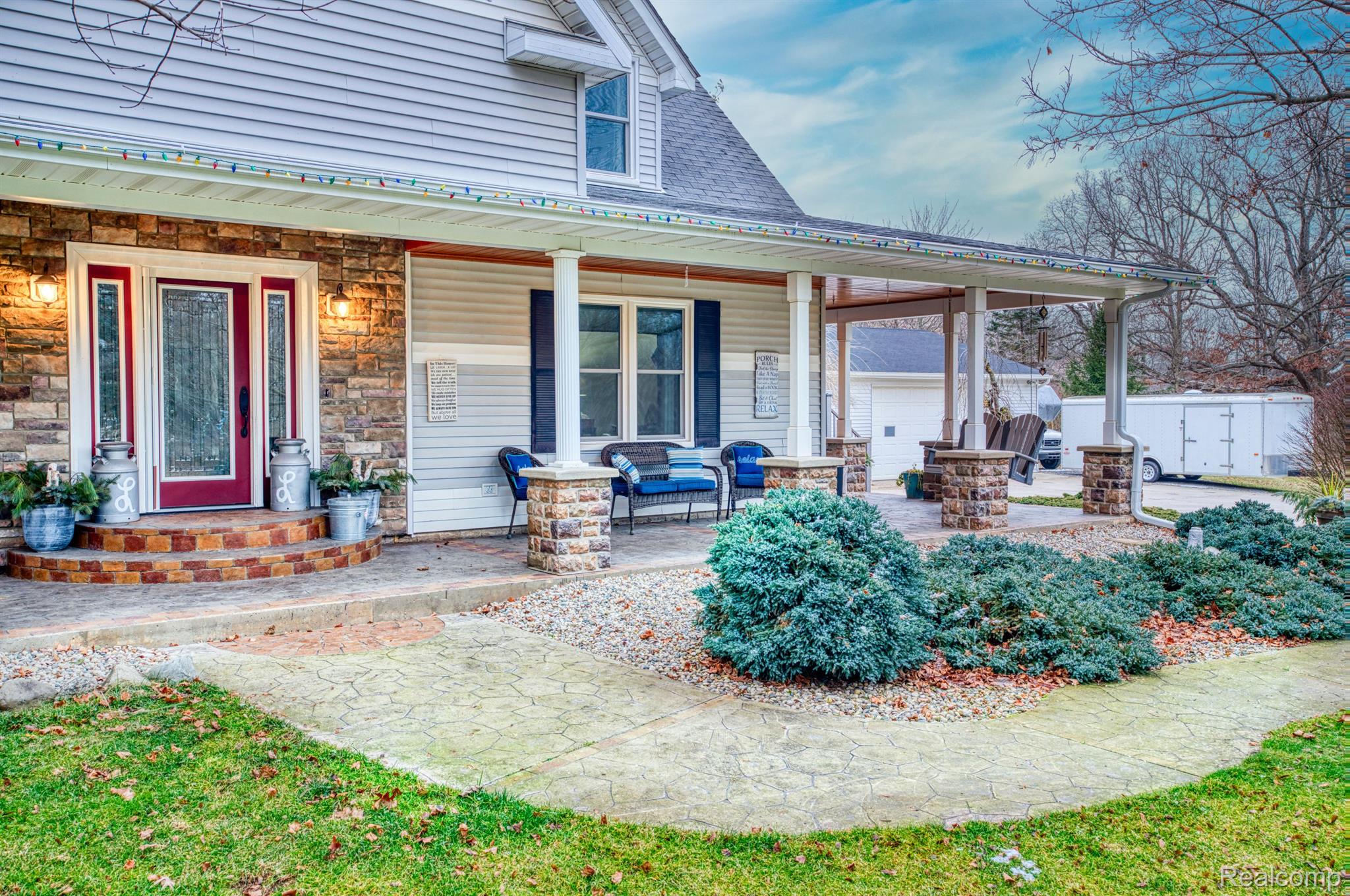 6884 West Lange Road Fowlerville, MI 48836 - Photo 40 of 59 OUTSIDE FRONT PORCH GETS ALOT OF USE...