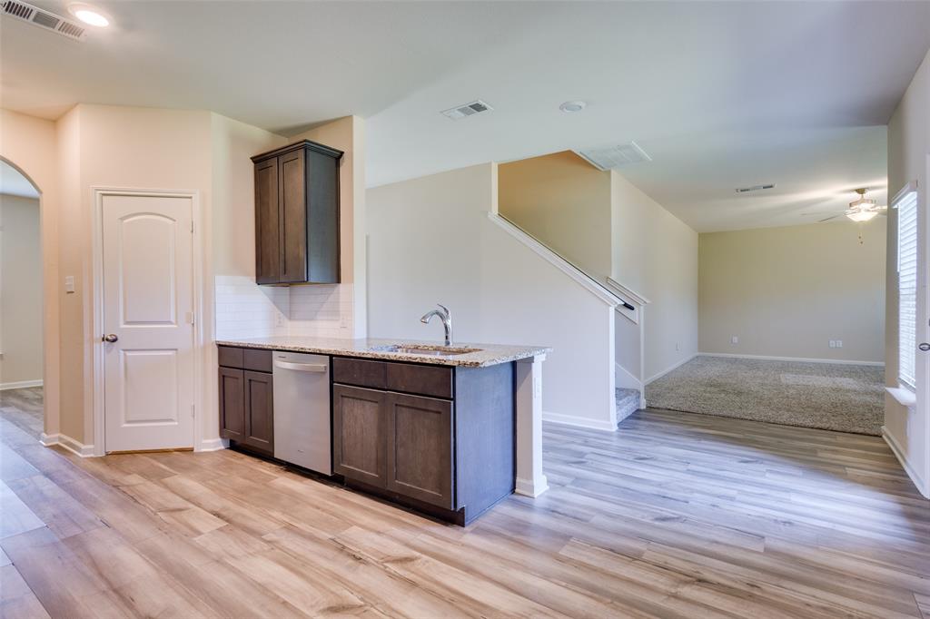 2256 Cashmere Way Princeton, TX 75407 - Photo 36 of 36 a view of kitchen with sink and wooden floor
