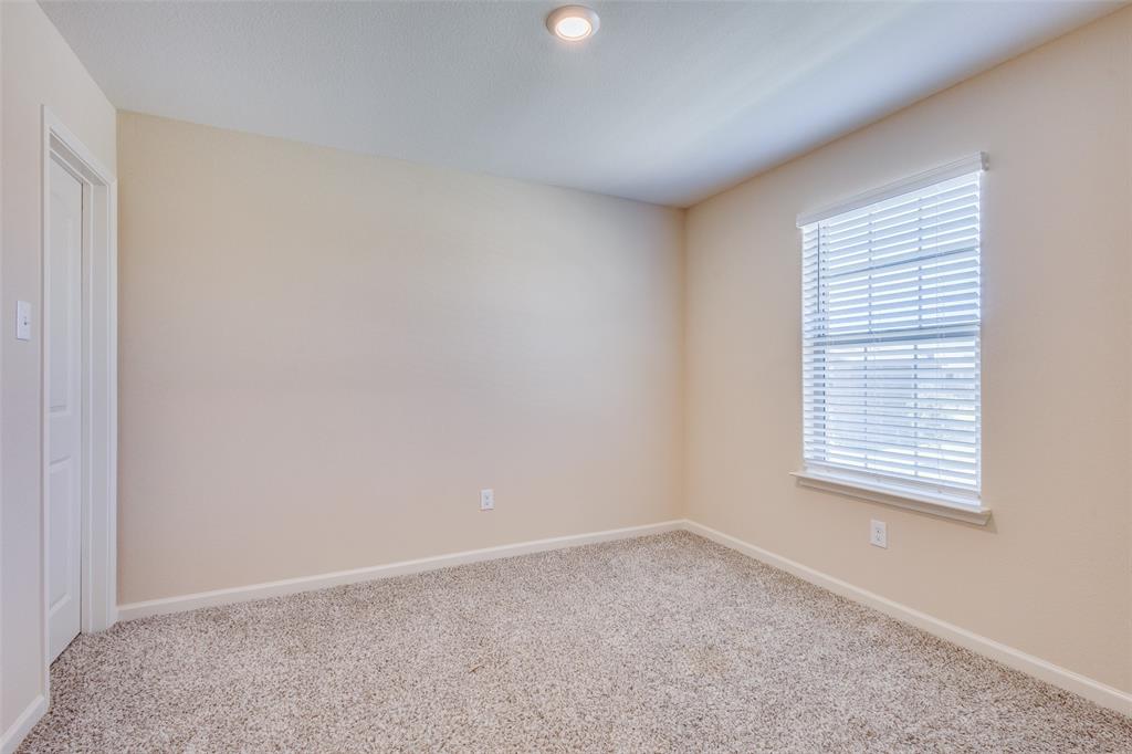 2256 Cashmere Way Princeton, TX 75407 - Photo 21 of 36 an empty room with a window