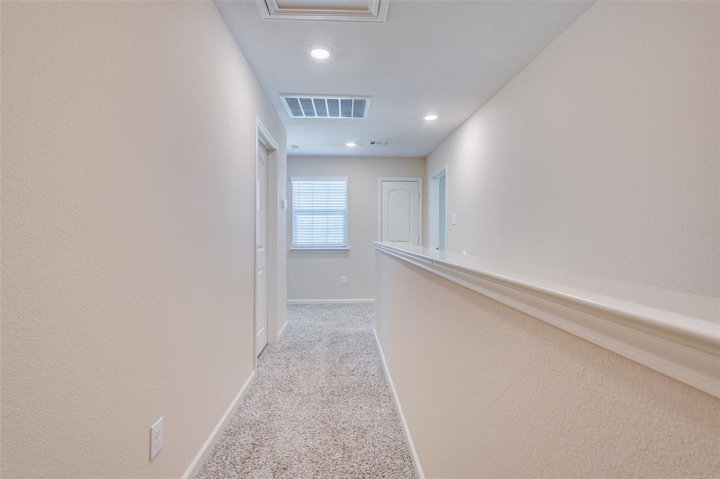 2256 Cashmere Way Princeton, TX 75407 - Photo 29 of 36 wooden floor in an empty room with a window