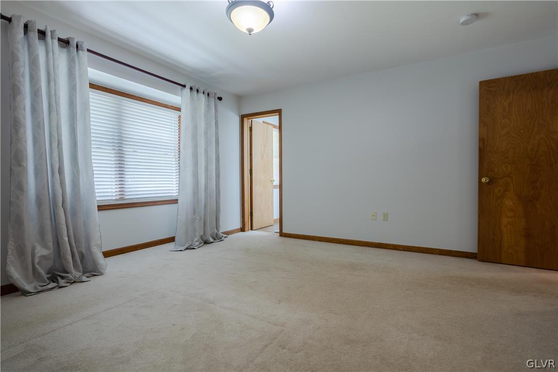 3348 Oberon Road Tobyhanna, PA 18466 - Photo 16 of 22 an empty room with windows