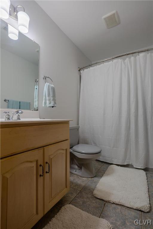 3348 Oberon Road Tobyhanna, PA 18466 - Photo 18 of 22 a bathroom with a sink a toilet and vanity