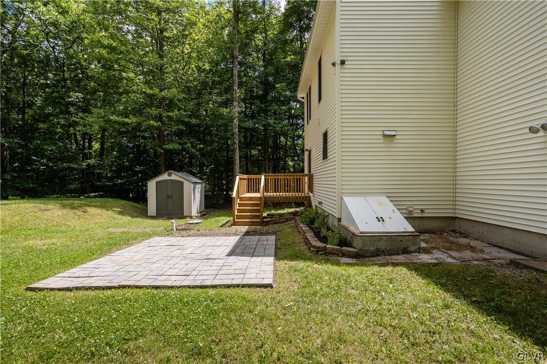 3348 Oberon Road Tobyhanna, PA 18466 - Photo 19 of 22 a view of a backyard with couches chair and grass