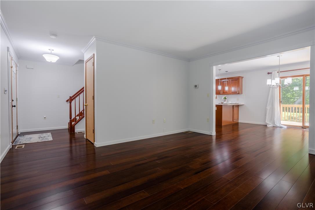 3348 Oberon Road Tobyhanna, PA 18466 - Photo 3 of 22 a view of an empty room with wooden floor and a window