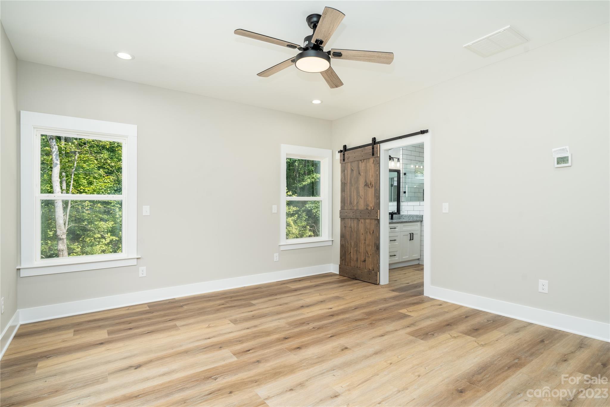 2512 Shuford Road, Unit 7A Lincolnton, NC 28092 - Photo 14 of 27 a view of a room with a ceiling fan and a window
