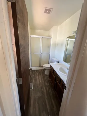 a bathroom with sink and mirror