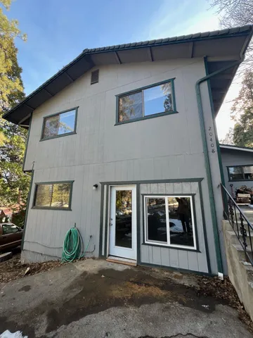 a view of a pathway with a yard