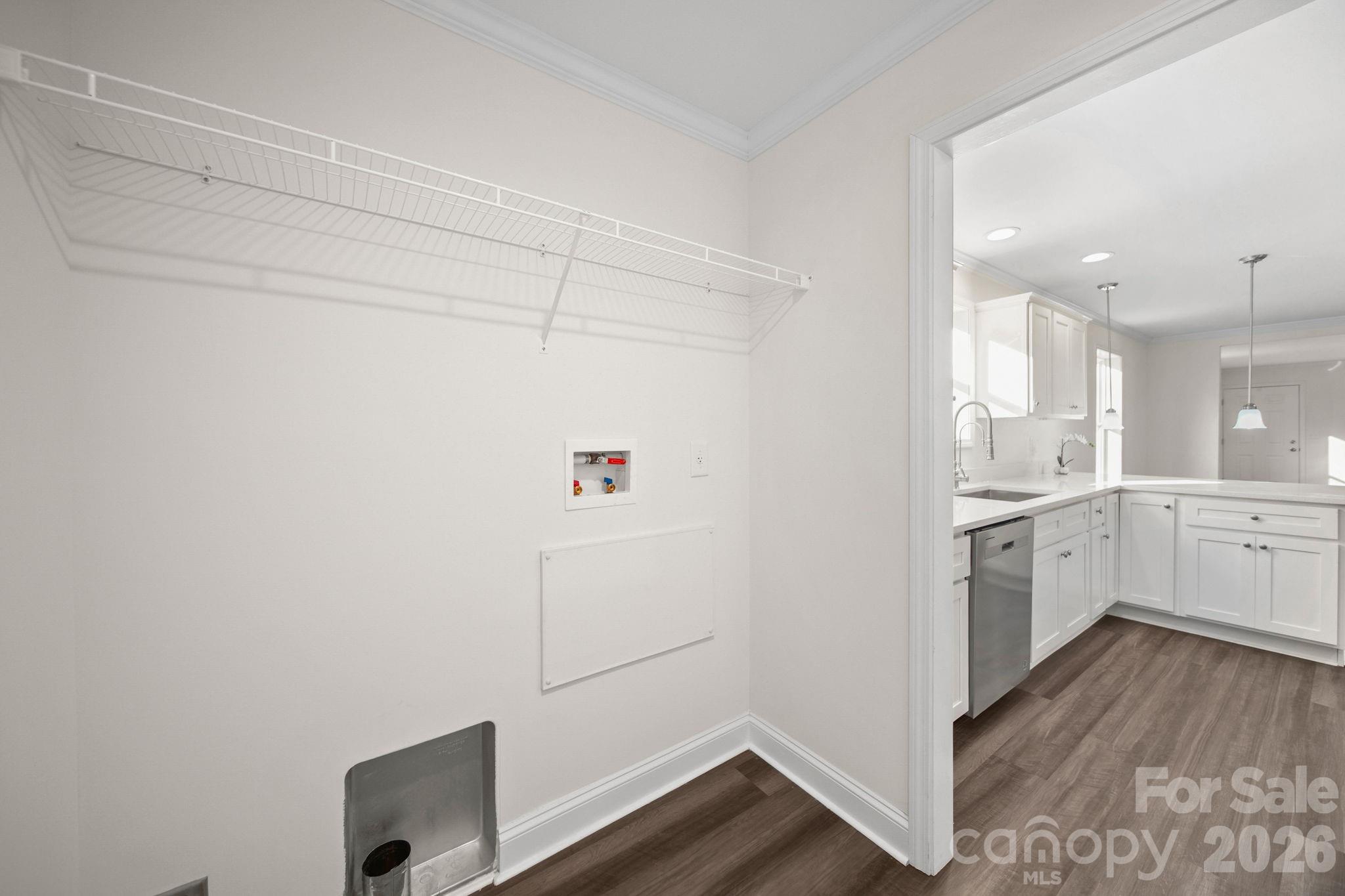 159 Hallman Street Cherryville, NC 28021 - Photo 19 of 37 a kitchen with cabinets and wooden floor