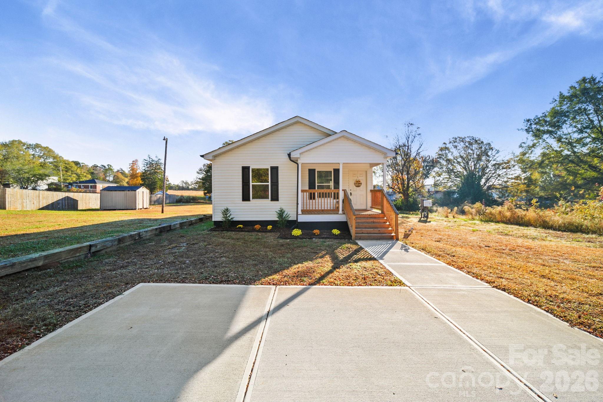 159 Hallman Street Cherryville, NC 28021 - Photo 2 of 37 a view of a house with a yard