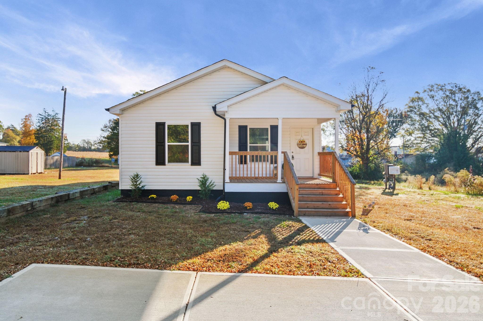 159 Hallman Street Cherryville, NC 28021 - Photo 3 of 37 a front view of a house with garden