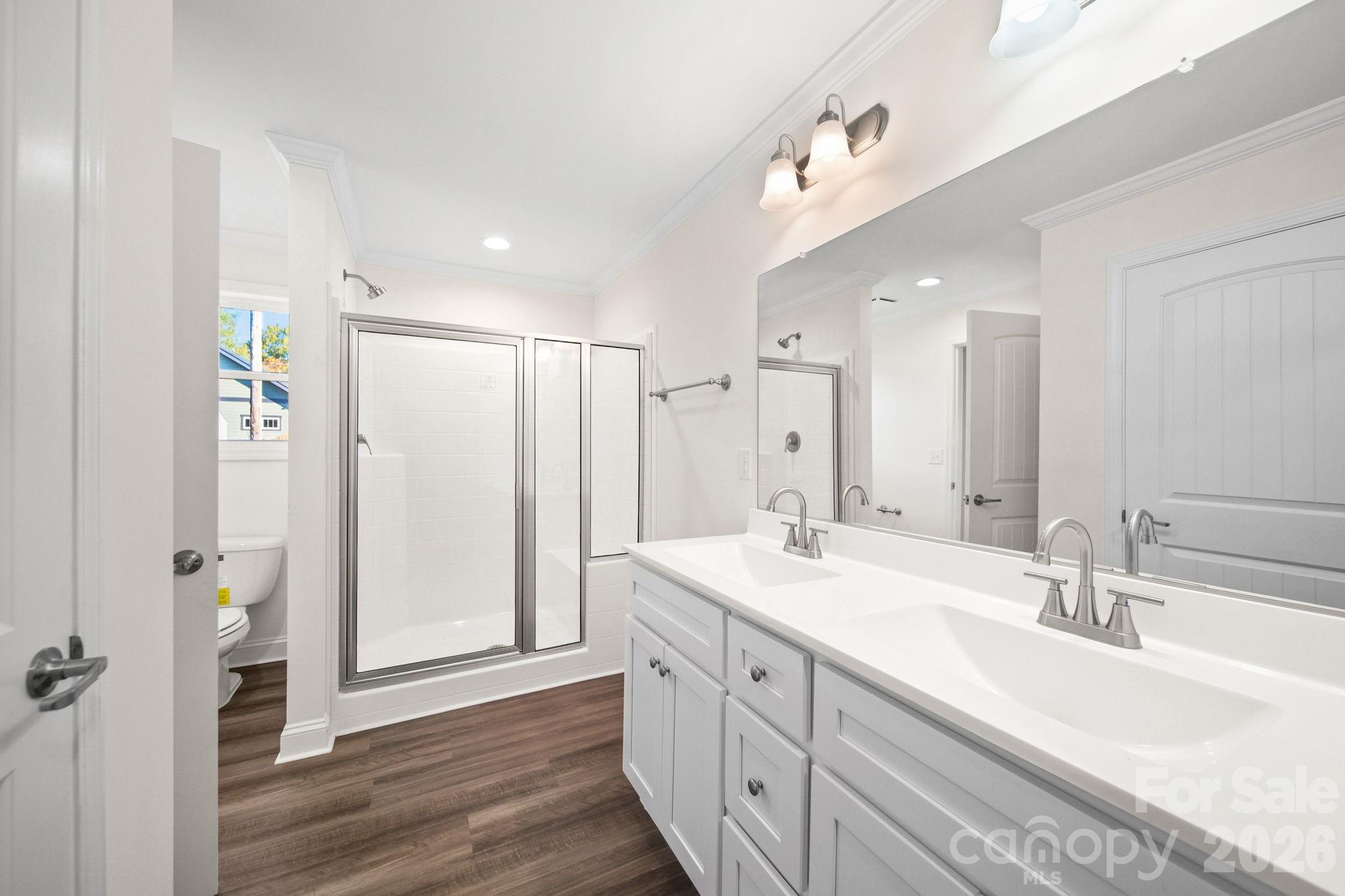 159 Hallman Street Cherryville, NC 28021 - Photo 33 of 37 a spacious bathroom with a double vanity sink mirror and shower