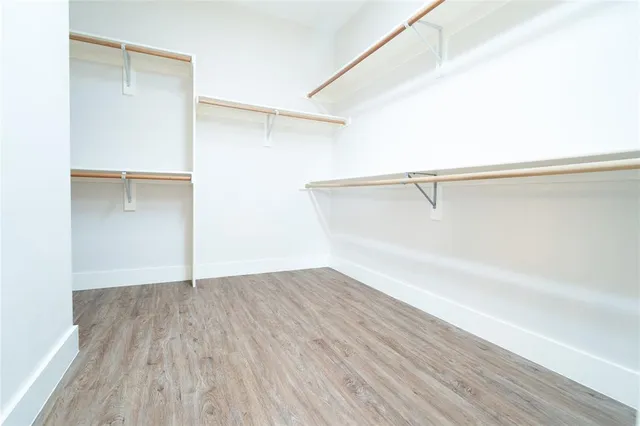 a view of an empty walk in closet