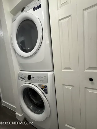 a utility room with dryer and washer