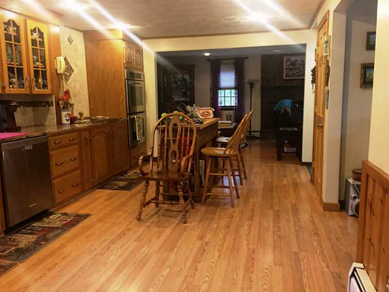 919 Whaley Hollow Road Coventry, RI 02816 - Photo 4 of 25 Kitchen. very open flws from dining to living room