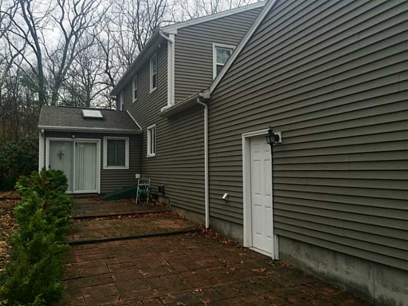 919 Whaley Hollow Road Coventry, RI 02816 - Photo 5 of 25 Patio/Deck. block patio off florida room