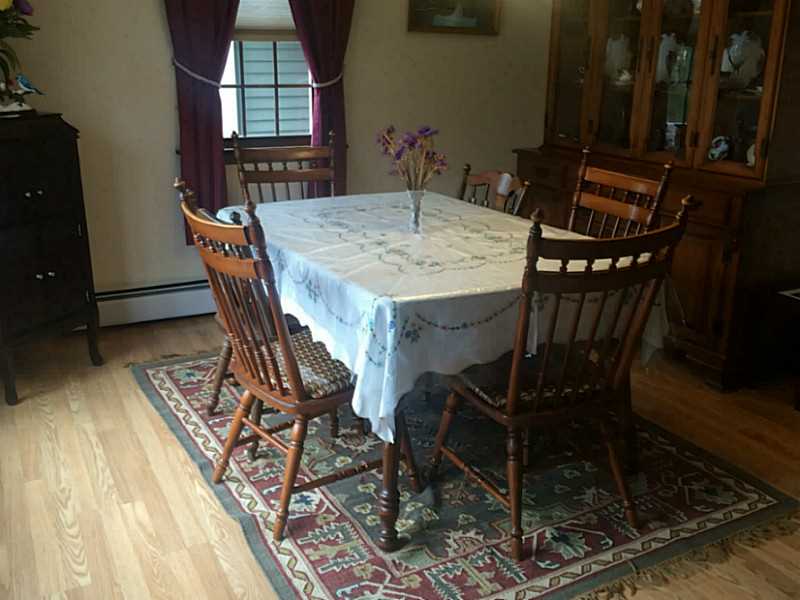 919 Whaley Hollow Road Coventry, RI 02816 - Photo 7 of 25 Dining Room. ample size dining with large bow window