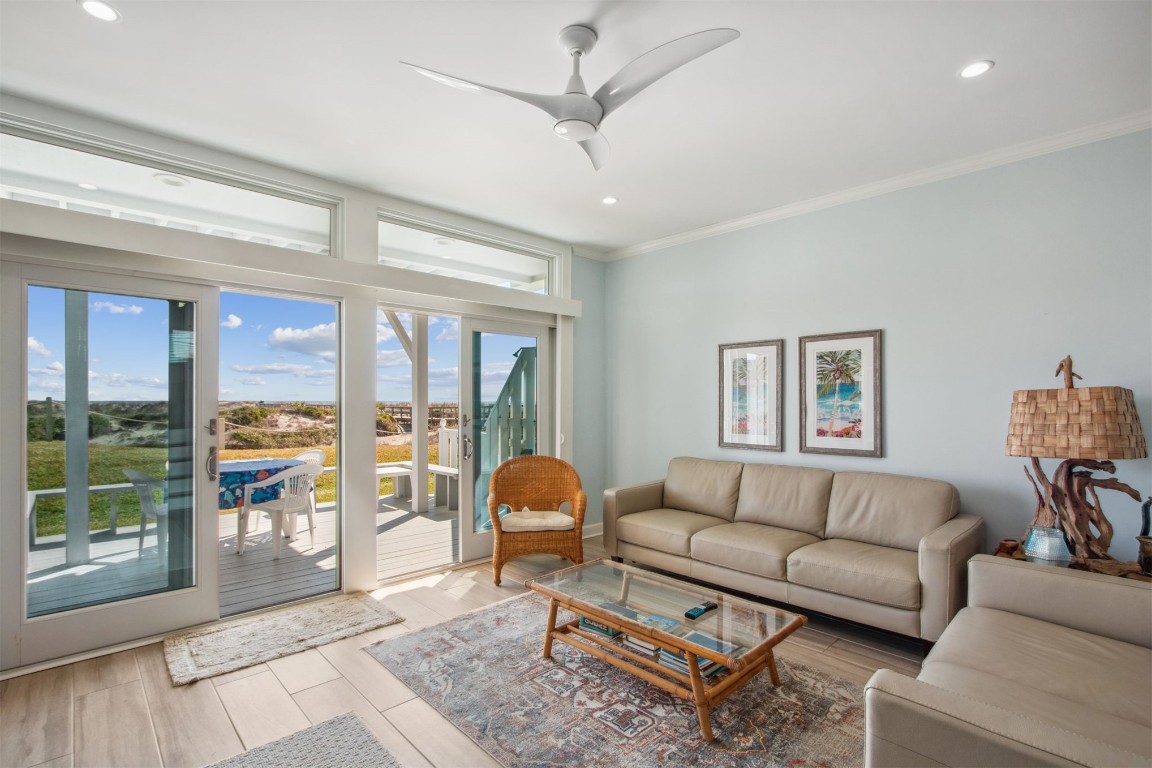 95078 Sandpiper Loop Fernandina Beach, FL 32034 - Photo 12 of 38 a living room with furniture and a large window with outer view
