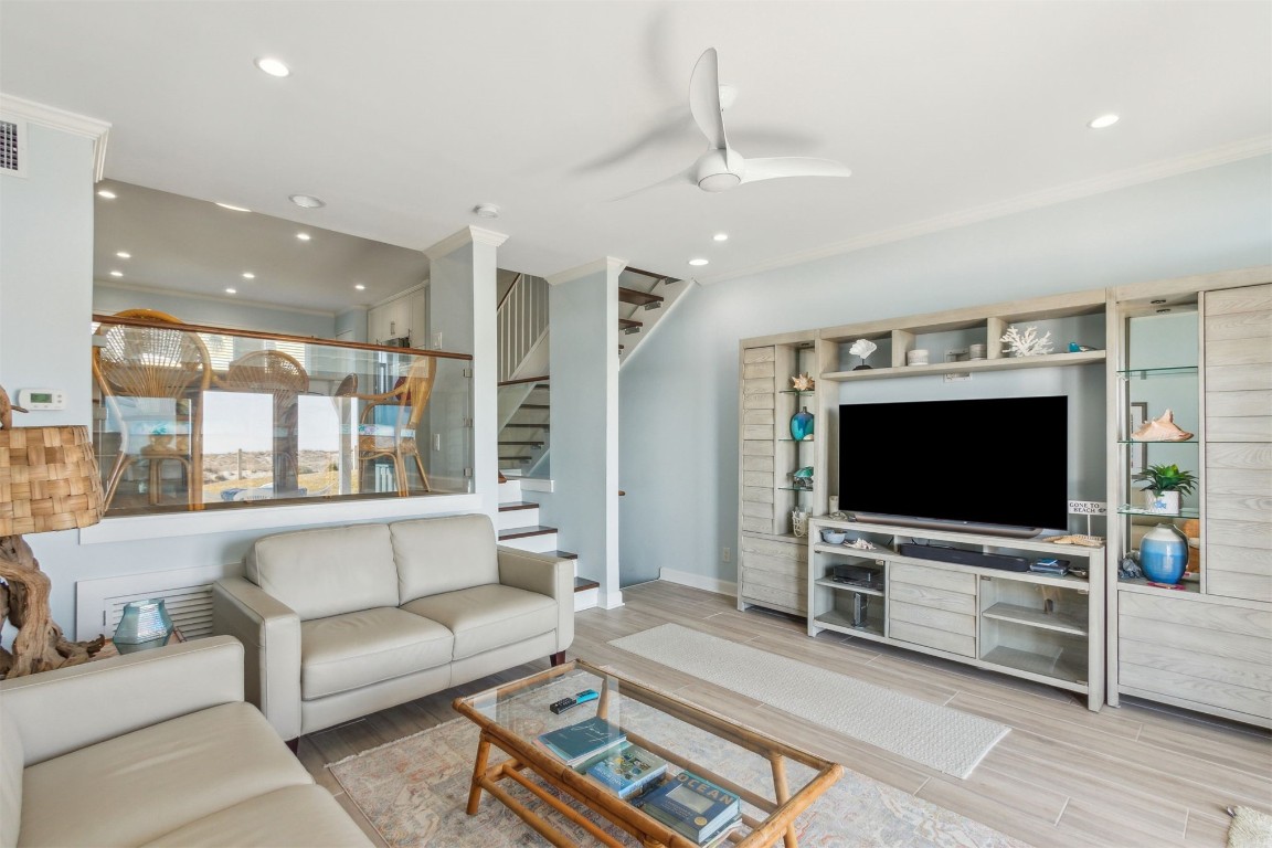 95078 Sandpiper Loop Fernandina Beach, FL 32034 - Photo 15 of 38 a living room with furniture and a flat screen tv