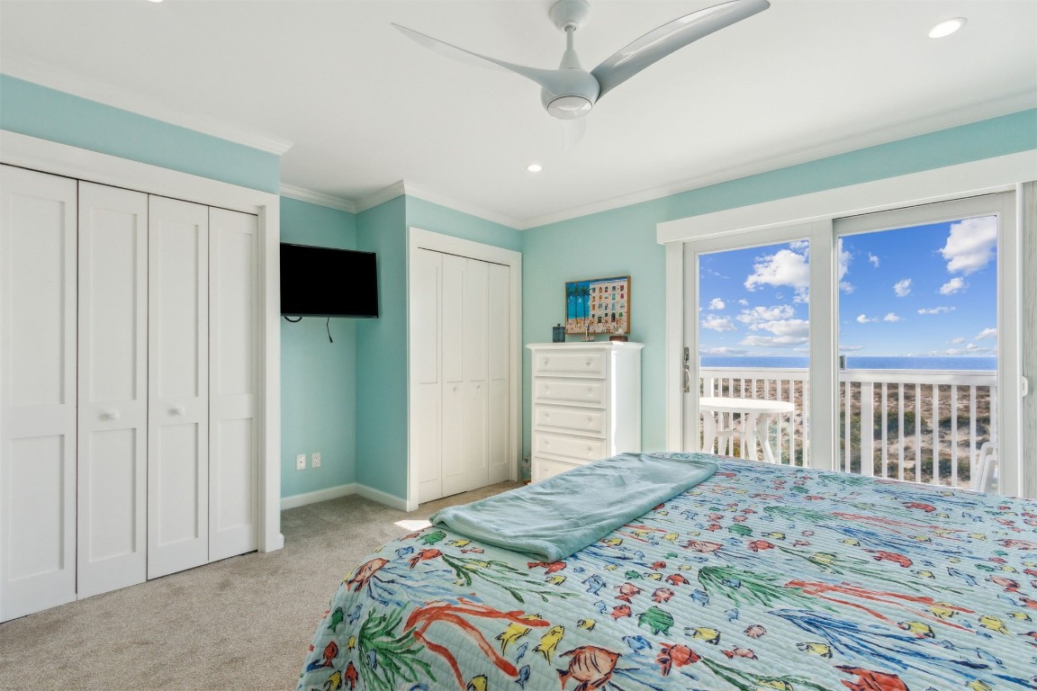 95078 Sandpiper Loop Fernandina Beach, FL 32034 - Photo 21 of 38 a bedroom with a bed and a window