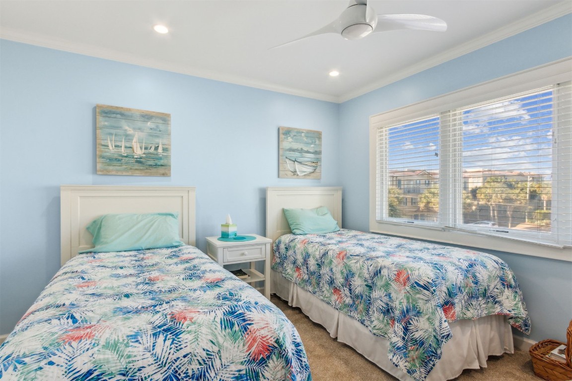 95078 Sandpiper Loop Fernandina Beach, FL 32034 - Photo 26 of 38 a bedroom with two beds and a window