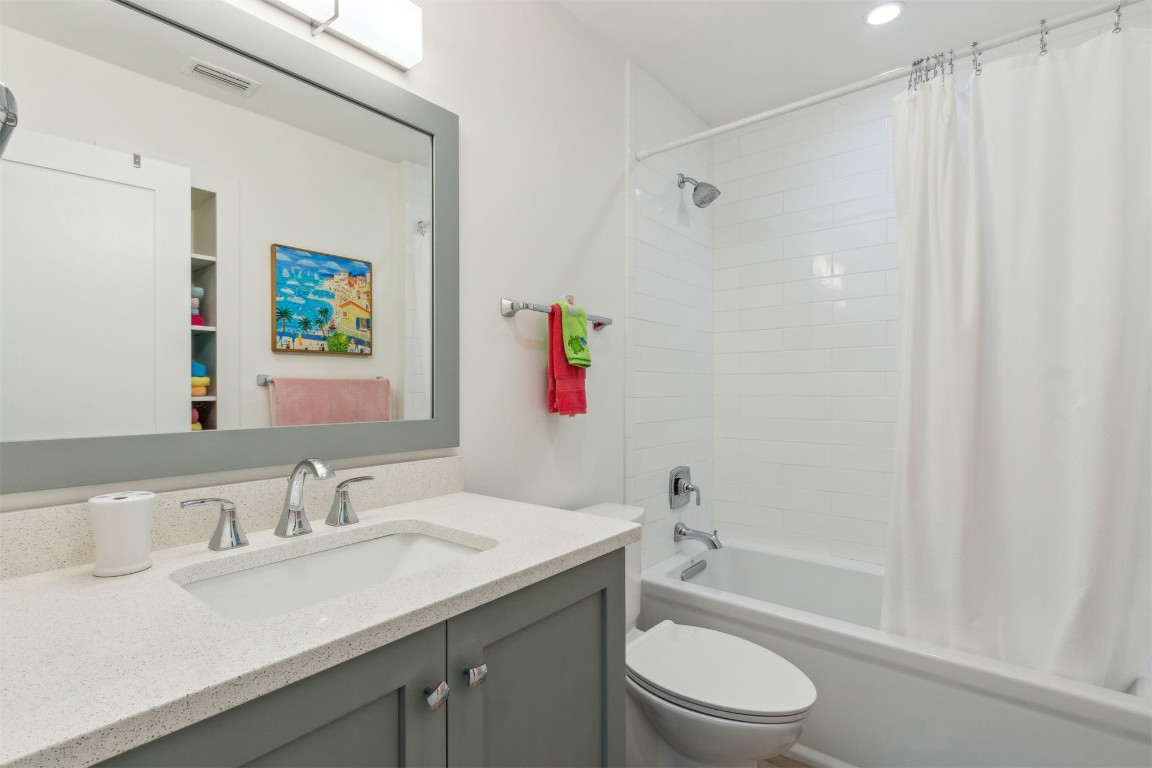 95078 Sandpiper Loop Fernandina Beach, FL 32034 - Photo 27 of 38 a bathroom with a sink toilet and shower