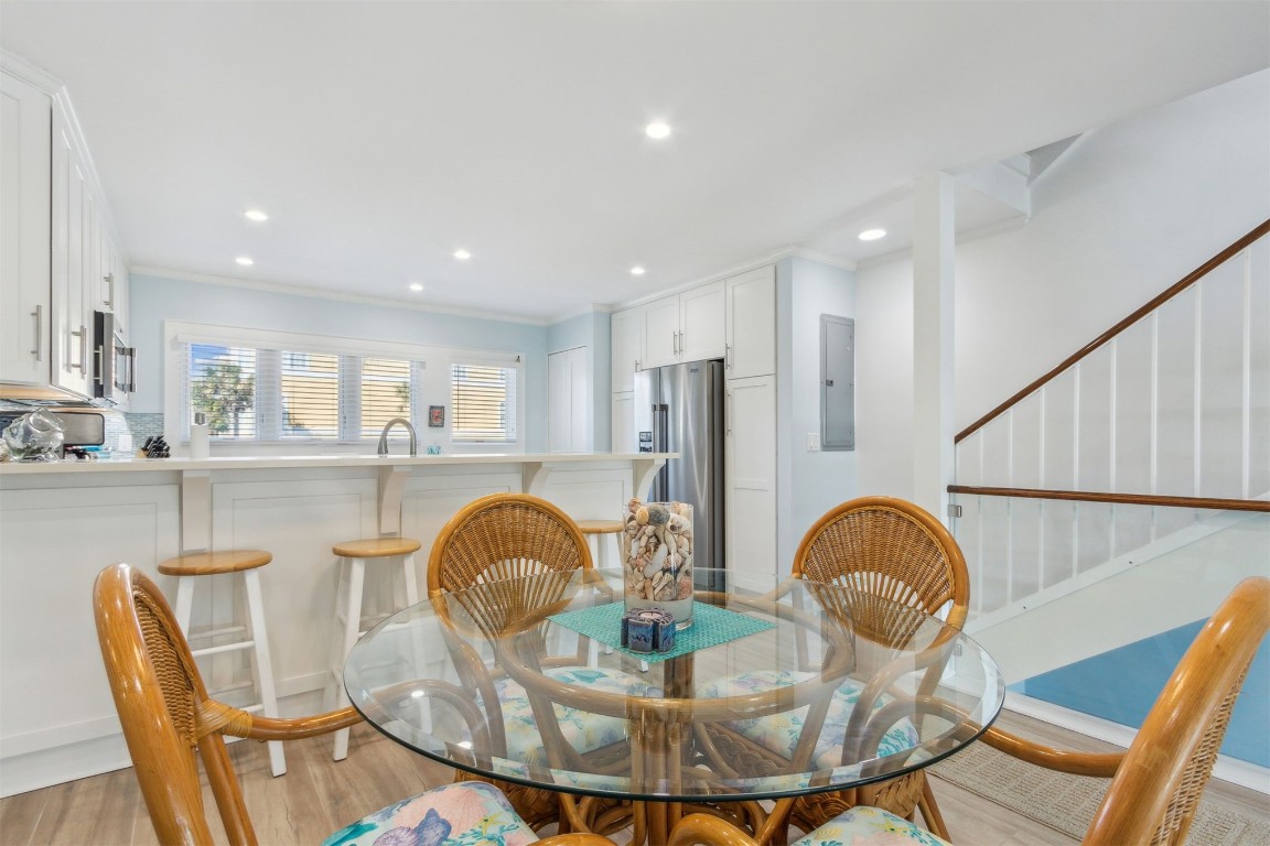 95078 Sandpiper Loop Fernandina Beach, FL 32034 - Photo 8 of 38 a dining room with furniture and wooden floor