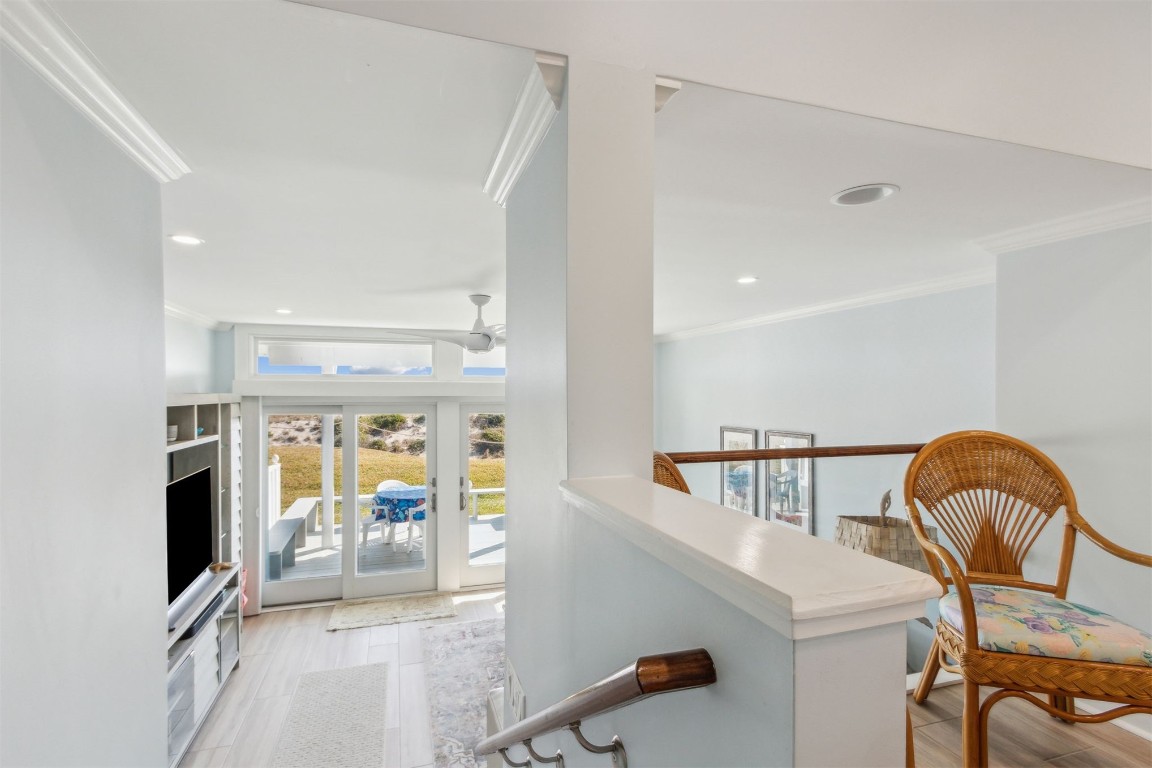 95078 Sandpiper Loop Fernandina Beach, FL 32034 - Photo 9 of 38 a view of a kitchen with furniture and staircase