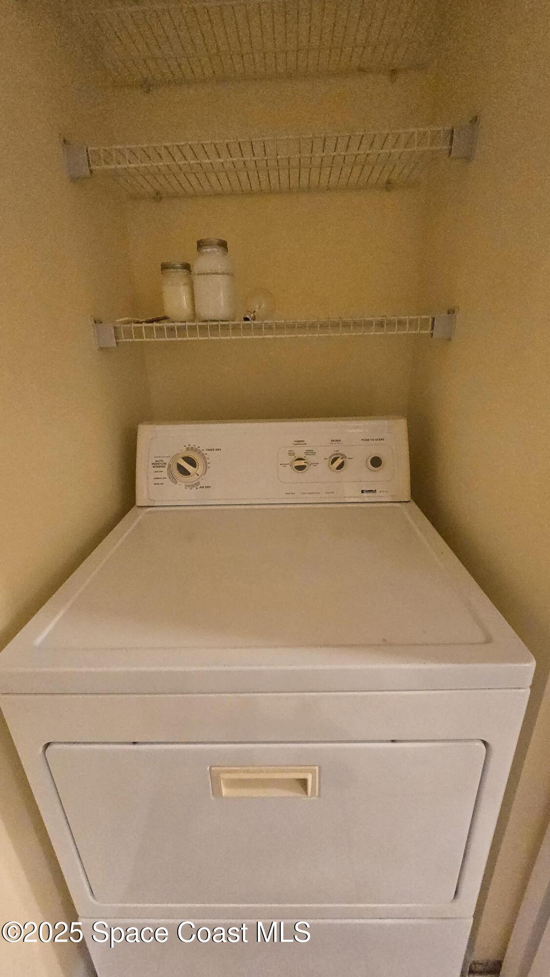 7667 North Wickham Road, Unit 1116 Melbourne, FL 32940 - Photo 12 of 34 a close up view of washer and dryer